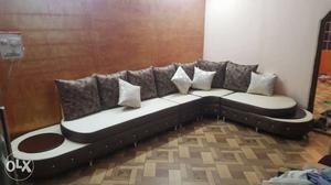 Brown And White Sectional Sofa With Pillows Set