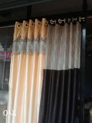 Gray, Black, And Beige Grommet Curtain