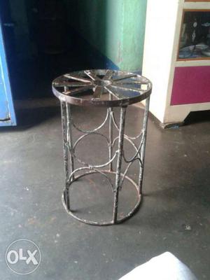 Gray Metal Round Base Cylindrical Frame