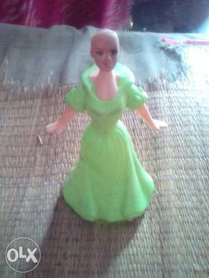 Green Dressed Female Plastic Doll