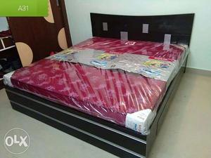 New queen size storage bed 11k with 5years