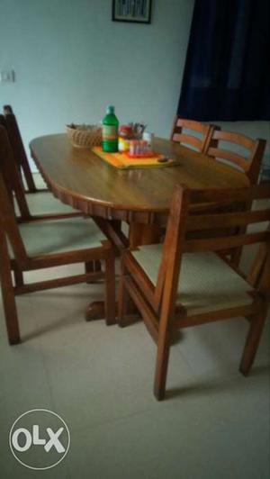Oval Brown Wooden Table With Chairs Dinning Set