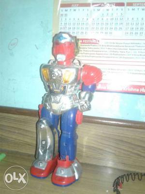 Red And Grey Toy Robot
