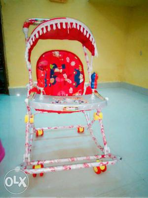Red And White Highchair