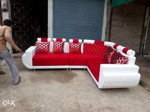 Red Sectional Couch With White Leather Strap
