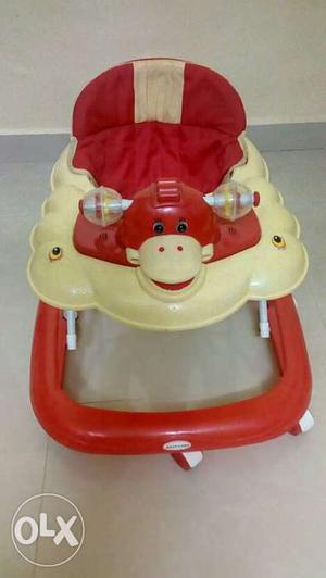 Red n cream colour baby walker used after 6