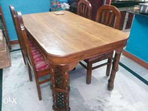 Teak wood dining table with 4 chairs