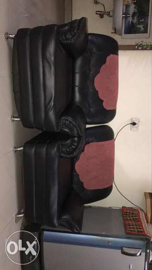 Two Balck Leather Sofa Chairs