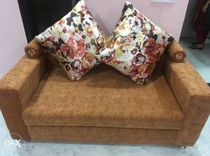 Two seat, Brand new sofa with floral cushions