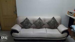 White And Black Leather Three Seat Couch