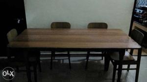 Wooden Dining Table & 4 chairs in good condition