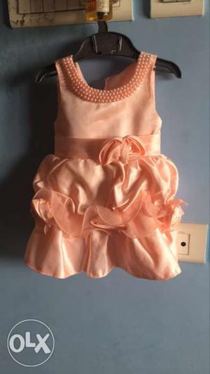 1 year old baby girl's party wear frock. Frock is