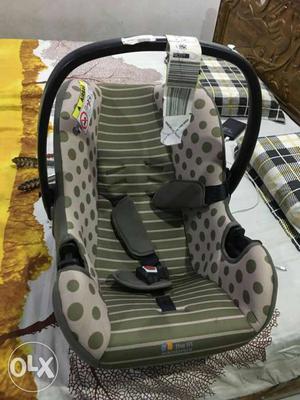 Baby's Green, Gray And Black Car Seat Carrier
