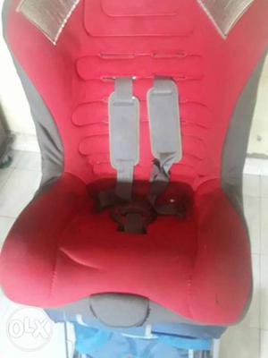 Baby's Red And Gray Car Safety Seat