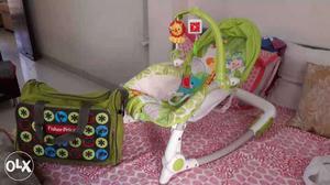 Baby's White And Green Fisher-Price Bouncer Seat