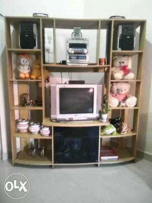 Beige Wooden Entertainment Center With CRT TV