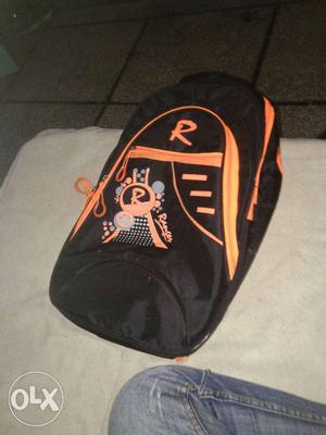Black And Orange Rawlings Backpack