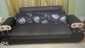 Black And White Stripe 7 seater Sofa and Wooden Table