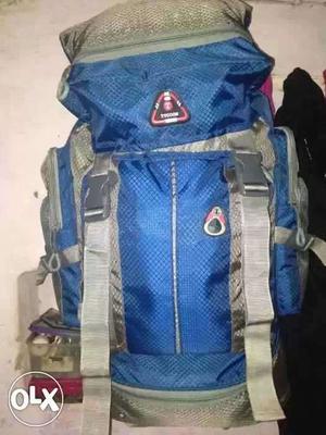 Blue and grey trekking bag.