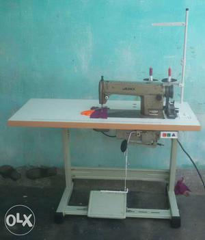 Brown And Grey Sewing Machine