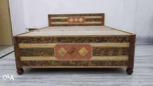 Brown, Red, And Beige Wooden Bed Frame
