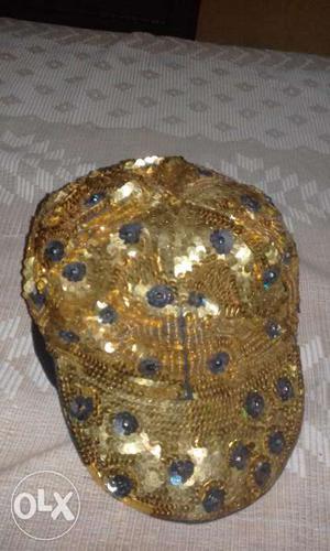 Each cap is of 150 rupees Gold caps-7(left)