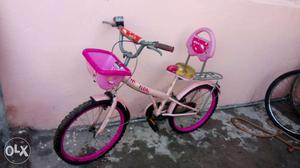 Kid's Pink And Black Bicycle