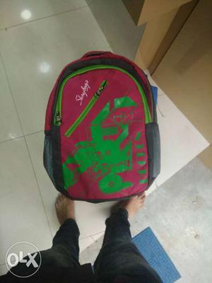 Pink, Black And Green Backpack