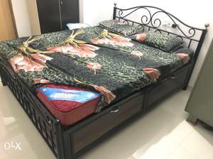 Queen size heavy metal storage bed with sleepwell