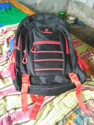 Red And Black Leebok Backpack