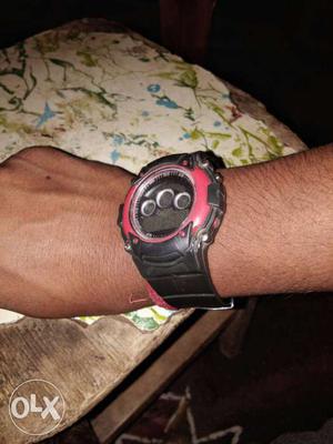 Round Red And Black Framed Digital Watch