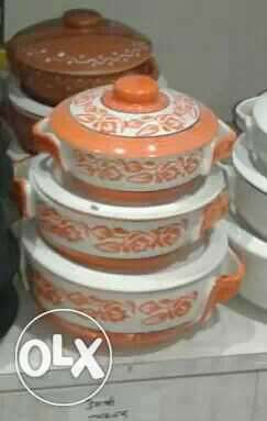 Round White And Orange Food Containers