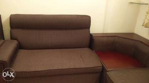 Two seater sofa and side table