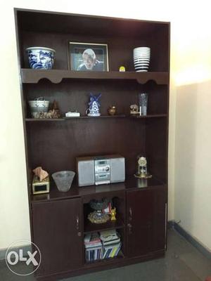 Unique and elegant shelf. Contains storage space,