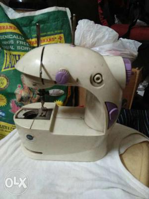 White Electric Treadle Sewing Machine