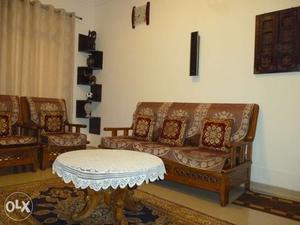Wooden Sofa with Center Table in good condition.