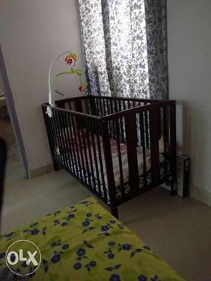 A beautiful 6 month old crib of mom n me. with