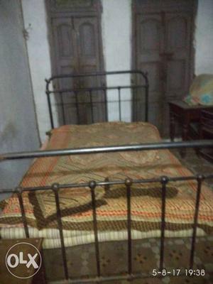 Black Metal Bed Framed With 100 years old iron antique