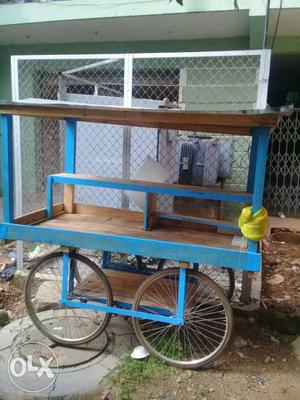 Blue Wooden Wheeled Stall