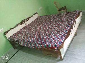 Brown And White Wooden Bed Frame With Mattress