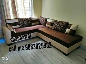 Brown and cream sectional sofa