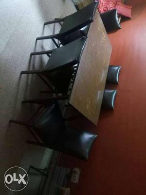 Dinning table with 6 chairs of wood and foam with