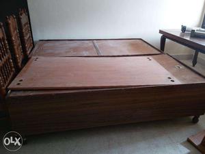 Single cots with storage and a wooden shoe rack for sale