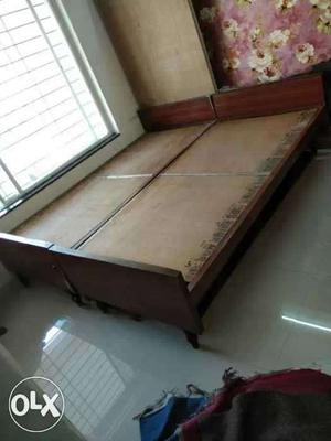 Two Brown Wooden Beds / King size bed