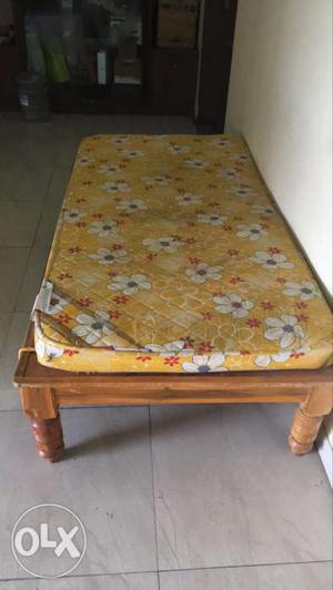 Wooden single bed with matress