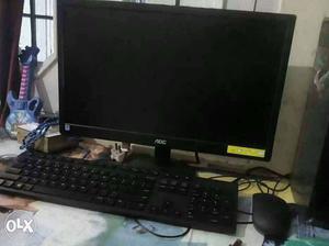 AOC Flat Screen Computer Monitor With Computer Keyboar