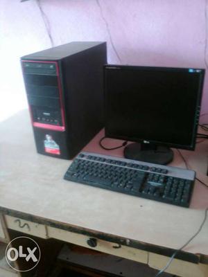 Black Flat Screen Computer Monitor, Keyboard And Tower W