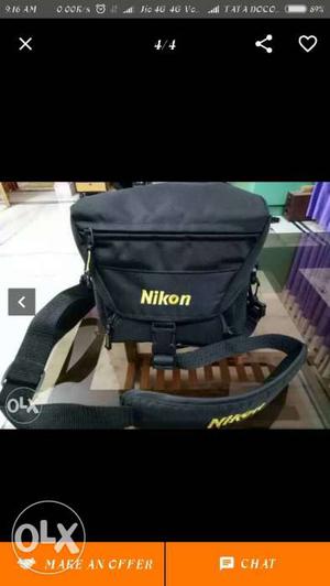 Black Nikon DSLR Camera Bag