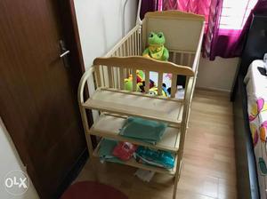 Brown Wooden Crib With 3-tier Shelf