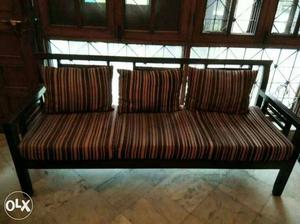 Brown Wooden Frame Padded Fabric Sofa With Pillows